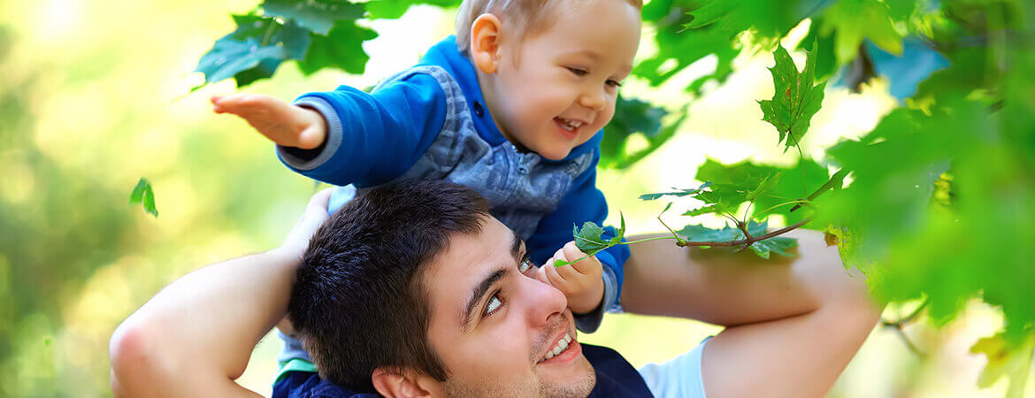 banner-father-and-son-having-fun-playing-outdoor