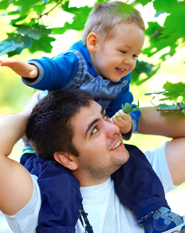 banner-father-and-son-having-fun-playing-outdoors