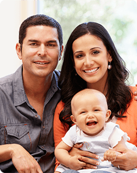 banner-new-parents-posing-with-their-infant-daughter