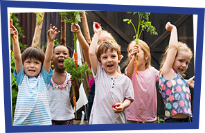 Kids holding carrots