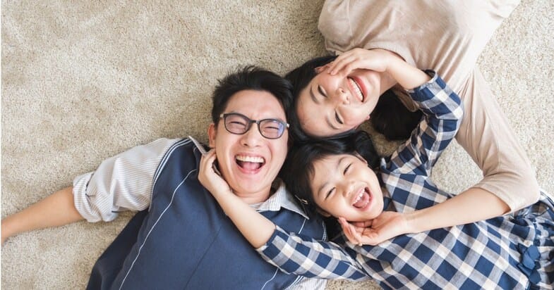 happy-asian-family-laying-with-happy-and-smile-top-view-picture