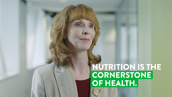 A frame of Rachel Buck discussing nutrition with the caption "nutrition is the cornerstone of health."
