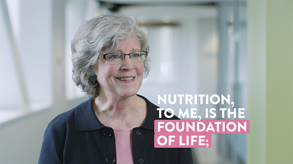 A frame of Melody Thompson discussing nutrition with the caption "nutrition, to me, is the foundation of life."