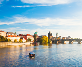 A sunny, riverside view of Prague, Czech Republic