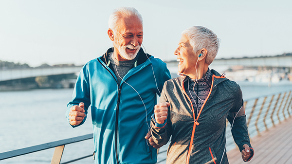 An older couple jogging.