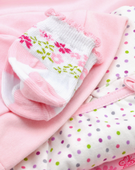 banner-pile-of-pink-baby-clothes