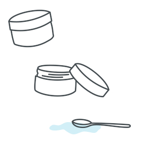 Open and closed food containers next to a spoon
