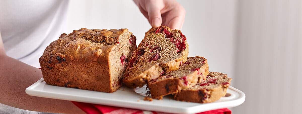 Sliced, easy cranberry bread made with Vanilla Ensure® Regular