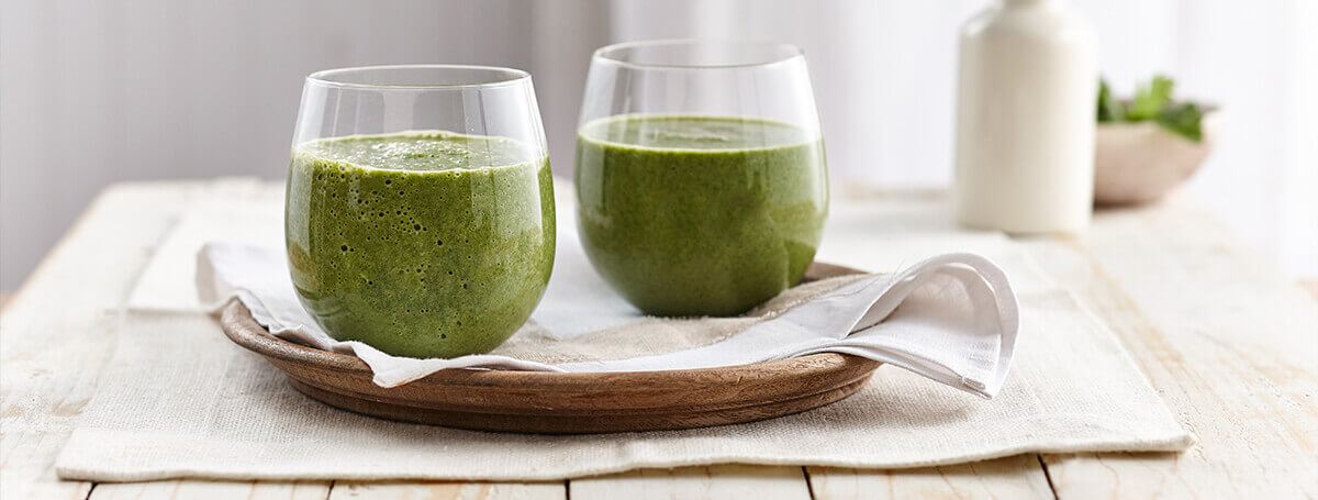 Green spinach smoothie recipe made with Vanilla Ensure® Enlive®